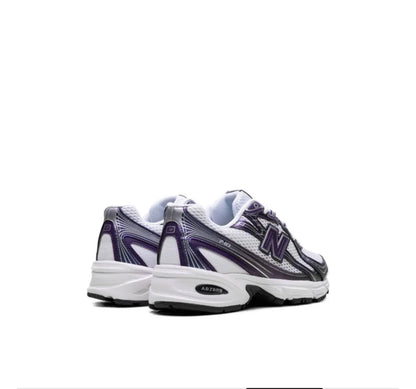 NEW BALANCE
Baskets 740 blanc et mauve